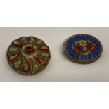 2 vintage micro mosaic brooches, one circular the other oval. Both with floral designs.