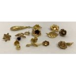 A small quantity of scrap gold stud and drop earrings, some stone set.