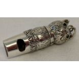 A sterling silver novelty whistle in the form of a cat. Mouthpiece marked "sterling".