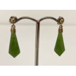 A pair of jade drop style earrings with gold tone fixings and posts. 9ct gold butterfly backs.