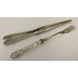 A pair of silver handled glove stretchers with German silver blades.