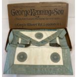 A vintage Masonic George Kenning lambskin Masters apron in original advertising card box.