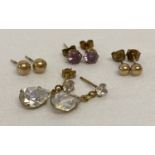 4 pairs of 9ct gold earrings in drop and stud styles.