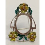 An Art Nouveau style, 925 silver, miniature picture frame with enamelled flower detail.