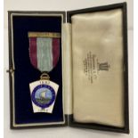 A boxed vintage enamelled silver Masonic Gosport Lodge 50th Anniversary medal.