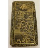 An Art Deco Japanese damascene cigarette case with engraved detail to both sides.