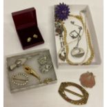 A collection of vintage and modern costume jewellery.