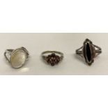 3 vintage stone set silver dress rings.