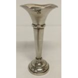 A vintage hallmarked silver bud vase with scalloped rim and stepped & weighted base.