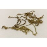 A small bag of broken 9ct gold chains suitable for scrap.