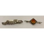 2 vintage silver brooches. A bar style sweetheart brooch with lily of the valley decoration.