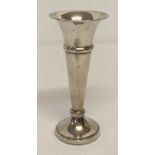 A vintage hallmarked silver bud vase with weighted base.