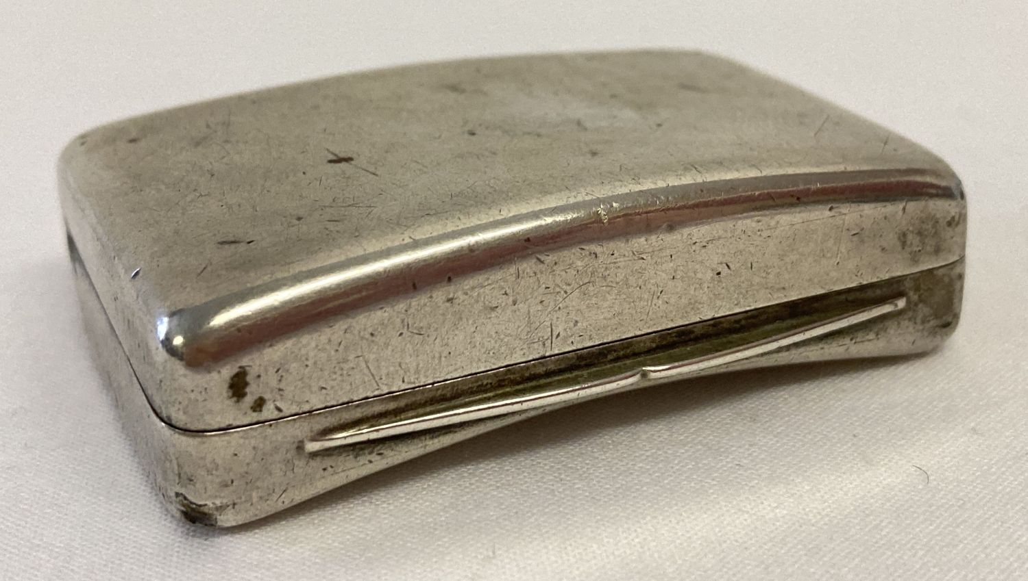 An antique Georgian silver snuff box with curved base by Matthew Linwood Birmingham 1807.