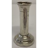 An antique silver miniature candlestick by Asprey & Co, London.