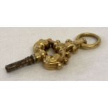 An antique gold watch key with ornate decoration. Tests as 14ct gold.