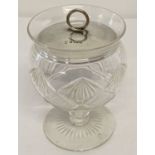 An Edwardian glass preserve bowl with crisscross decoration and silver lid.