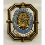 A hallmarked silver Royal Masonic School for Girls Bicentennial badge with pendant bale.