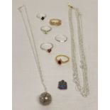 A collection of silver and costume jewellery. To include a Skegness charm.