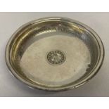 A 900 silver small pin dish with Arabic decoration.