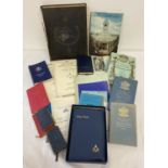 A box of assorted vintage Masonic books and booklets.