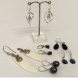 6 pairs of silver and white metal modern design drop style earrings