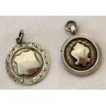 2 silver watch chain fobs, both with engraved detail to front and an empty cartouche.