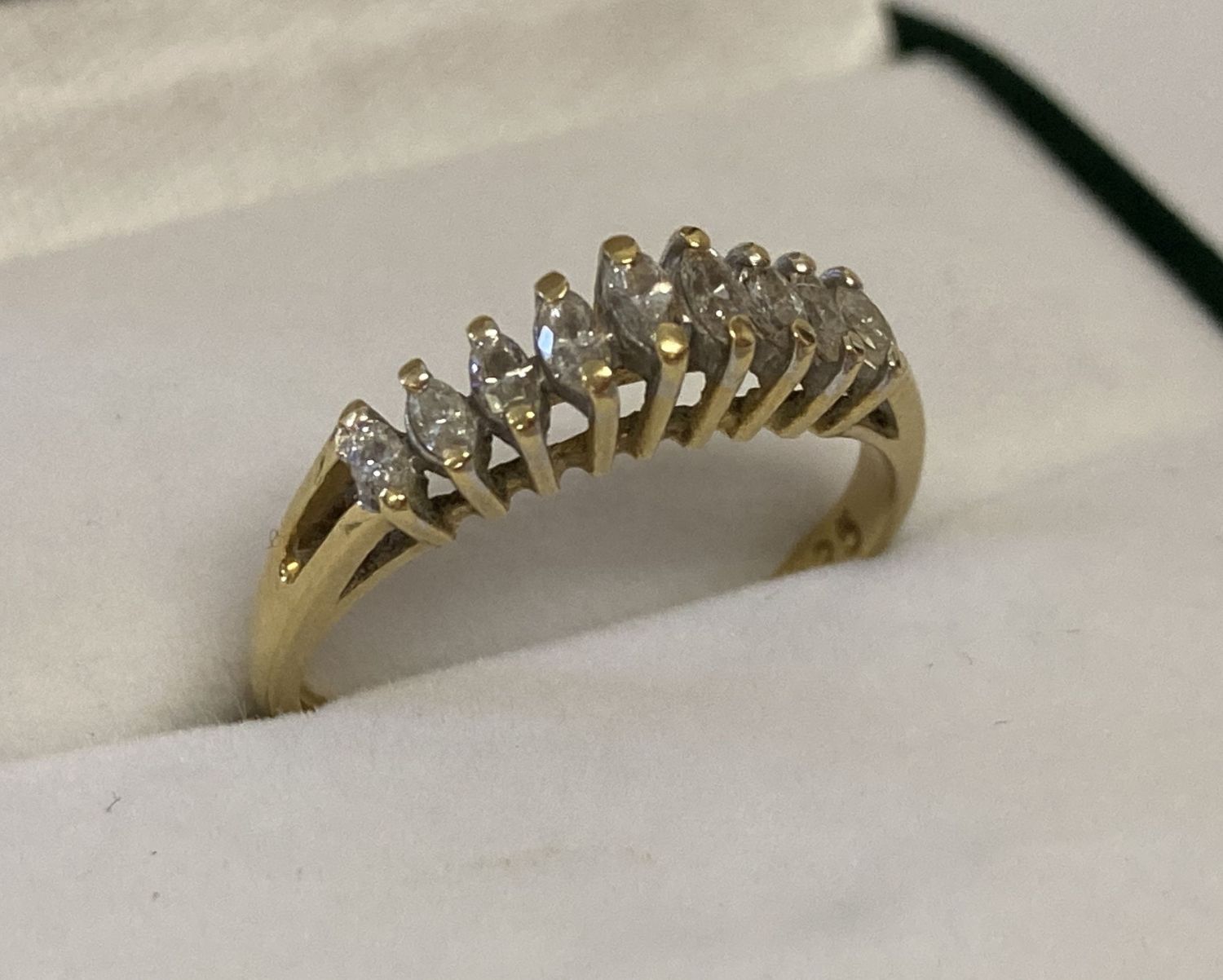 An 18ct gold and diamond cathedral design dress ring. Total diamonds .25ct.