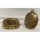 A small Victorian gold mourning brooch with decorative mount.