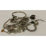 A quantity of scrap silver jewellery, some stone set. To include earrings, rings and bracelets.