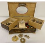 A vintage wooden marquetry musical jewellery box with ballerina and costume jewellery contents.