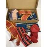 A box of assorted vintage Masonic collars.