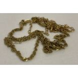 A small bag of broken 9ct gold chains suitable for scrap.