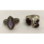 2 silver and stone set dress rings.