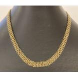 A 9ct gold vintage style decorative flat chain necklace with lobster clasp.