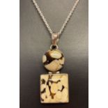 A double drop brown jasper and silver pendant on a 16 inch silver belcher chain.