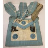 A vintage Masonic Masters lambskin apron and a collection of collars, one with Past masters pendant.