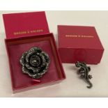 A boxed Butler & Wilson rose ring set with small clear and black stones.