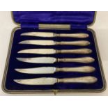 A cased set of silver handled fruit knives, hallmarked Sheffield 1936.