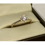 A 9ct gold cubic zirconia solitaire dress/engagement ring.