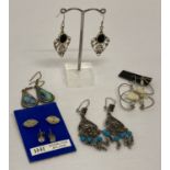 6 pairs of vintage and modern design silver and white metal earrings in both drop and stud styles.