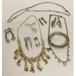 A collection of vintage and modern diamante jewellery.