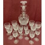 A cut lead crystal decanter together with 2 sets of Stuart Crystal stemmed glasses.