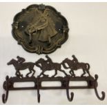 2 painted cast metal wall hanging coat hooks with horse detail.