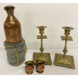 A collection of antique copper and brass items.
