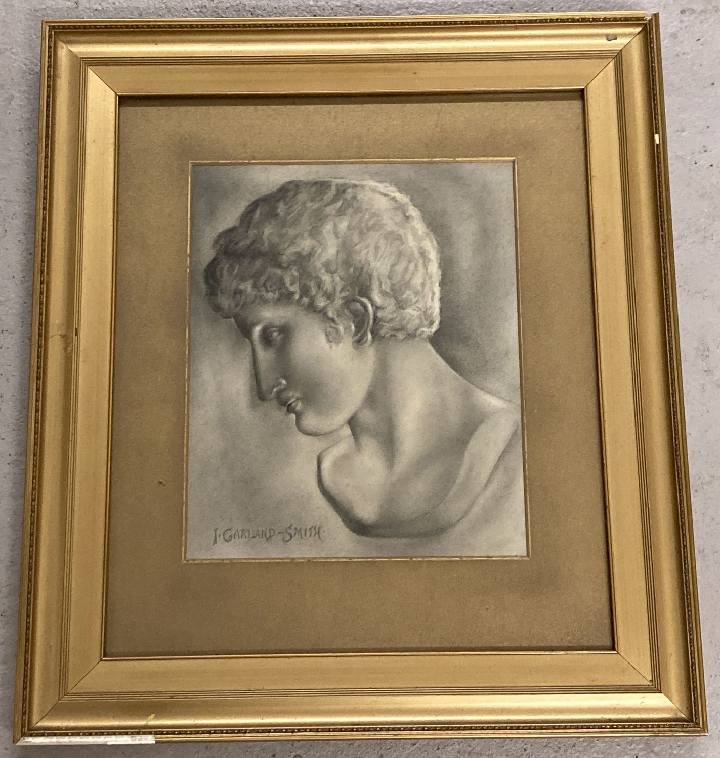 A framed and glazed watercolour classical style portrait signed I. Garland-Smith.