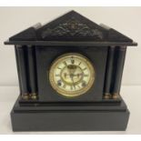 A Victorian black slate mantle clock from the Ansonia Clock Co.