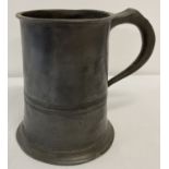 A vintage pewter quart measure tankard with both VR199 and ER 199 marks.