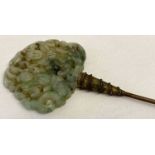 A vintage decorative pierced work, jade hair pin with figural detail.