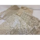 4 vintage lace tablecloths; 2 rectangular, 1 square and 1 circular.