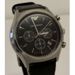 A men's chronograph wristwatch by Emporio Armani. Silver tone case with black engine turned face.
